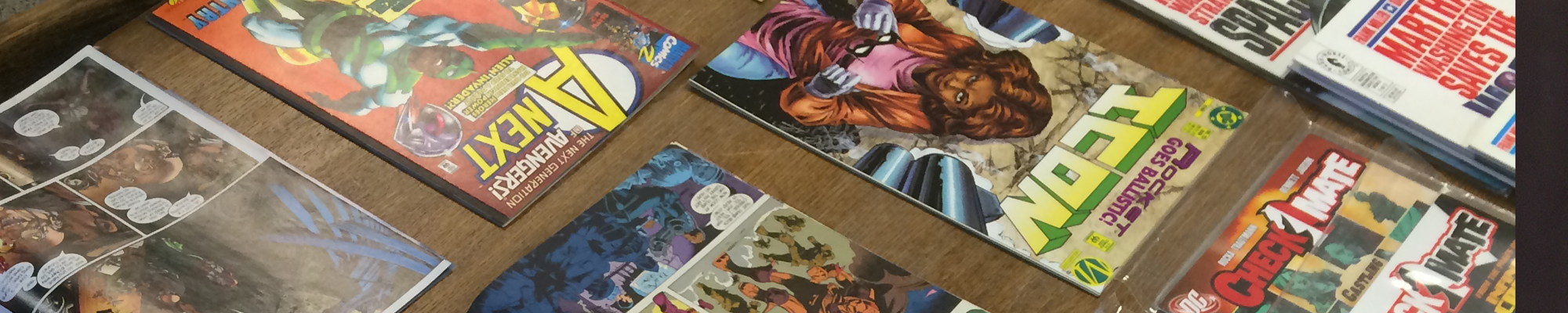 comics on table from library collection